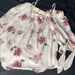 A cute flower blouse.